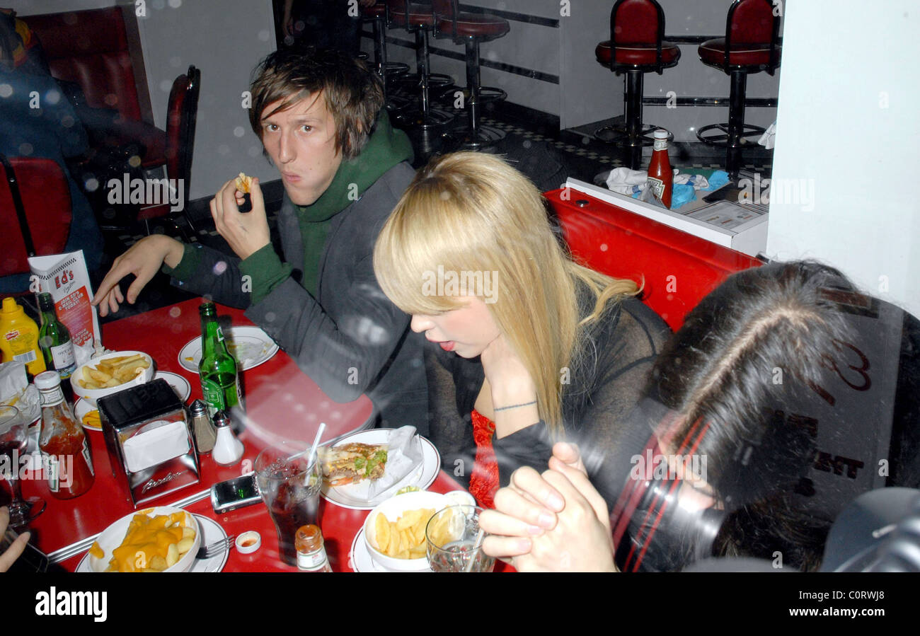 Peaches Geldof eating with friends at Ed's Diner in Soho London