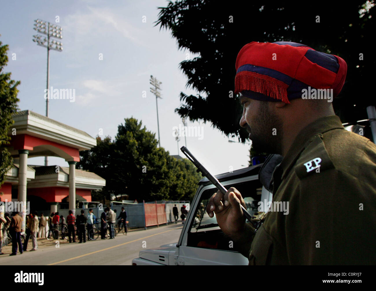 Security guards man machine guns outside the Mohali Stadium in Mohali