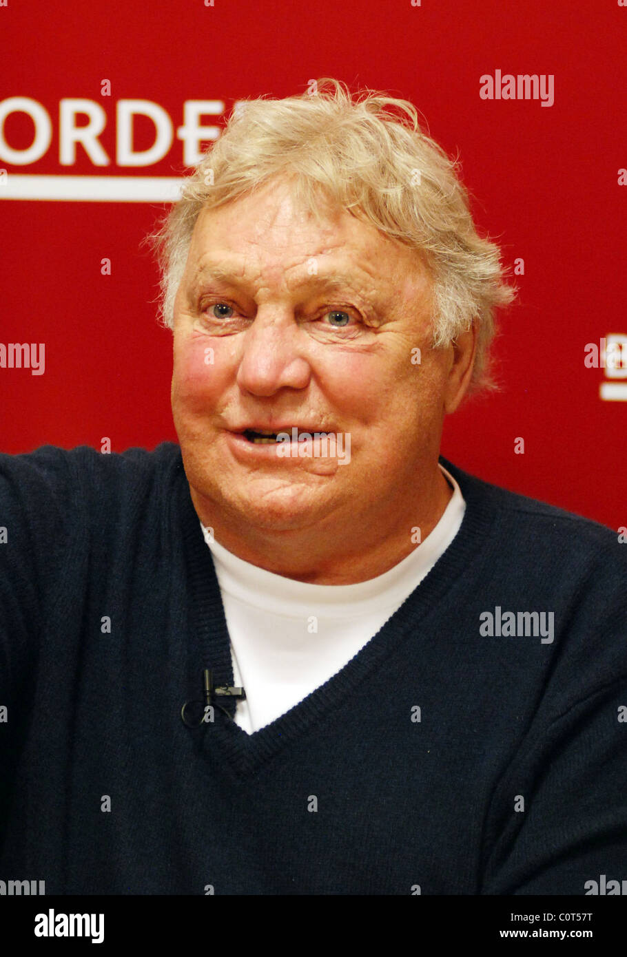 Bobby Hull, retired Canadian ice hockey player signs copies of his book 'One Goal Chicago's