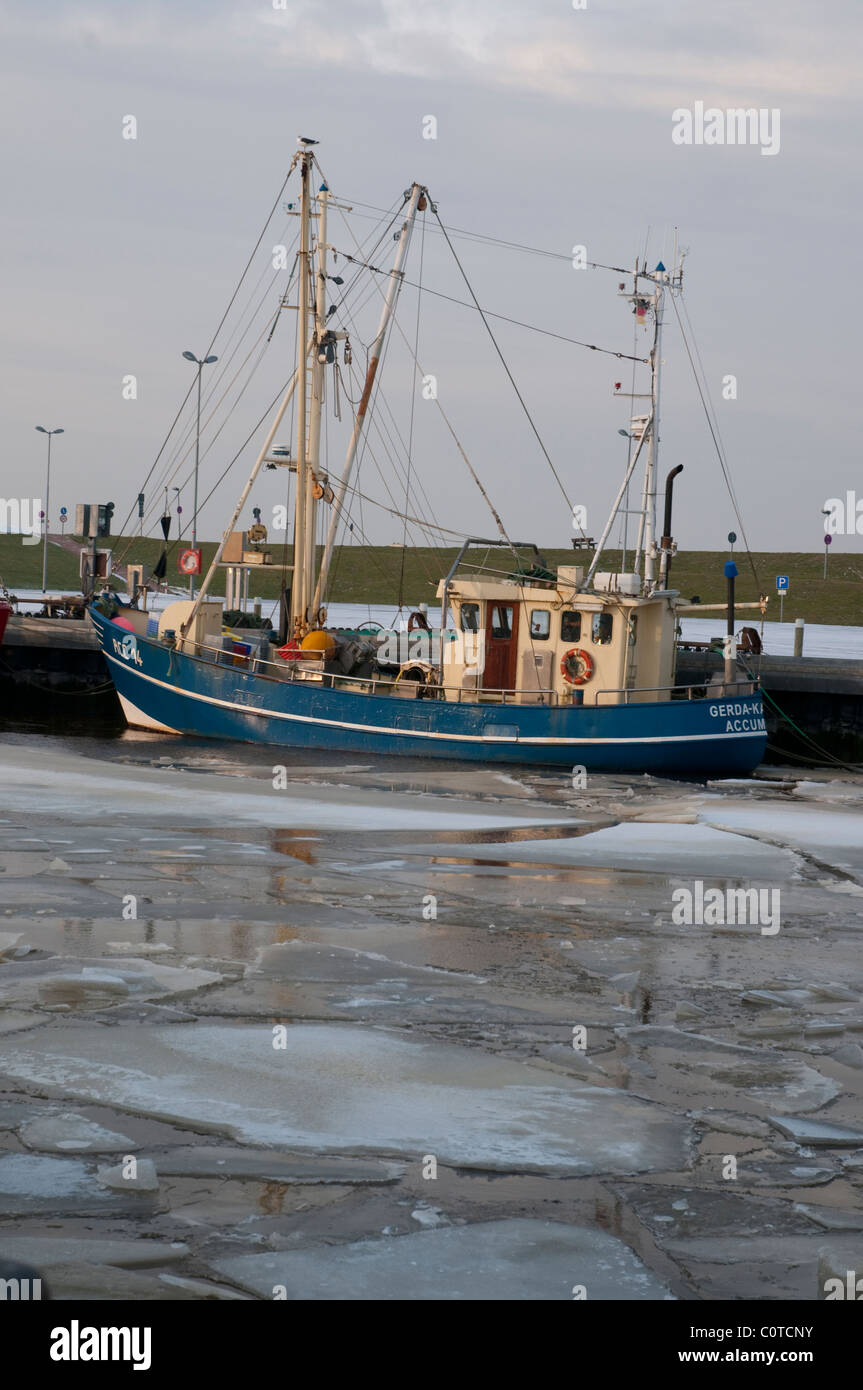 shrimp cutter in the harbour of Dornumersiel, East Frisia, Northsea Stock Photo