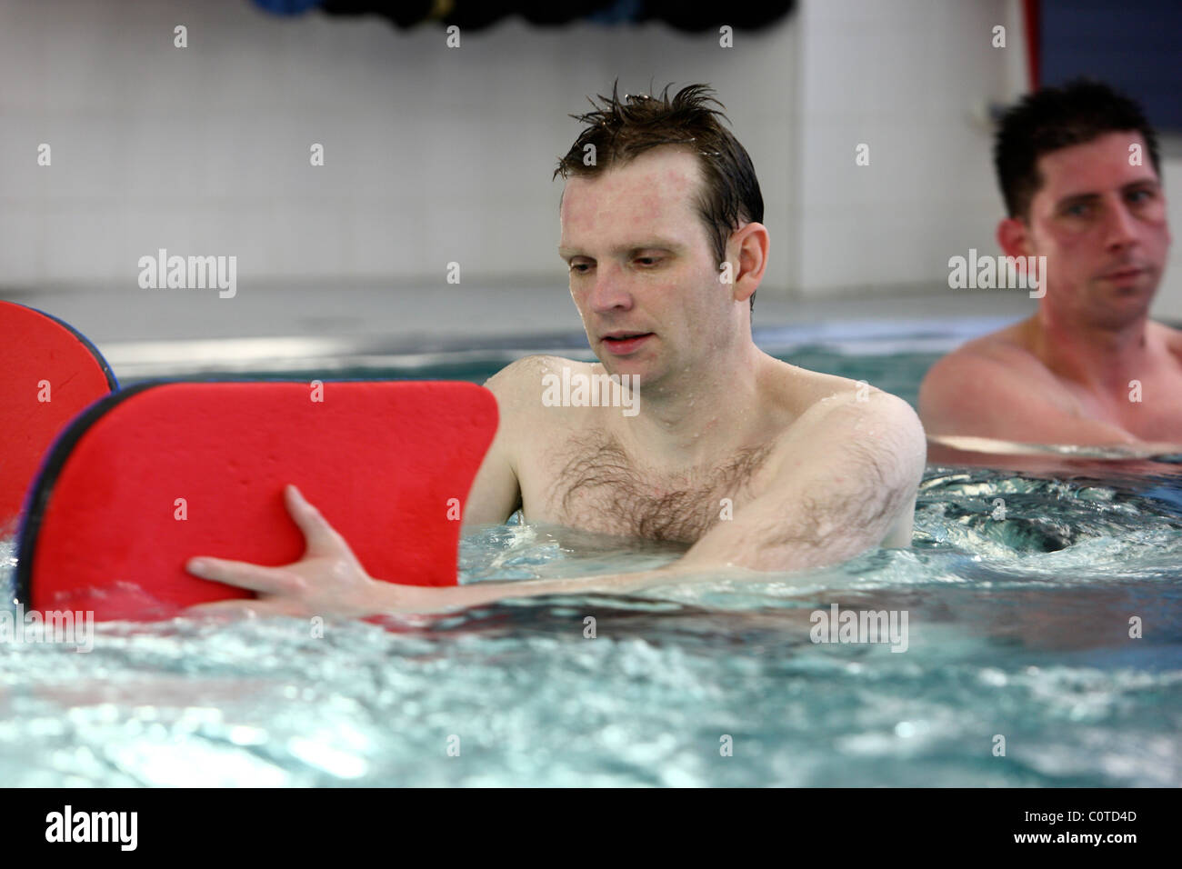 Water gymnastics, aqua aerobics as a physical therapy. Patients in a pool Stock Photo Alamy