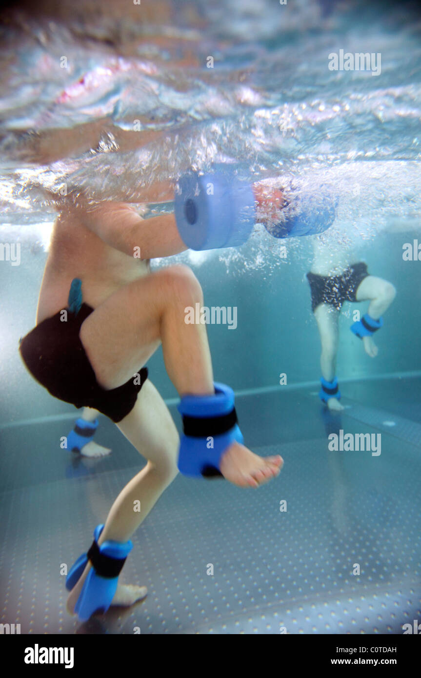 Water gymnastics, aqua aerobics as a physical therapy. Patients in a pool Stock Photo Alamy