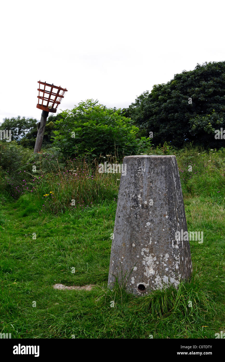 Triangulation Pillar on the summit of Warton Crag in Lancashire, England, UK. Stock Photo