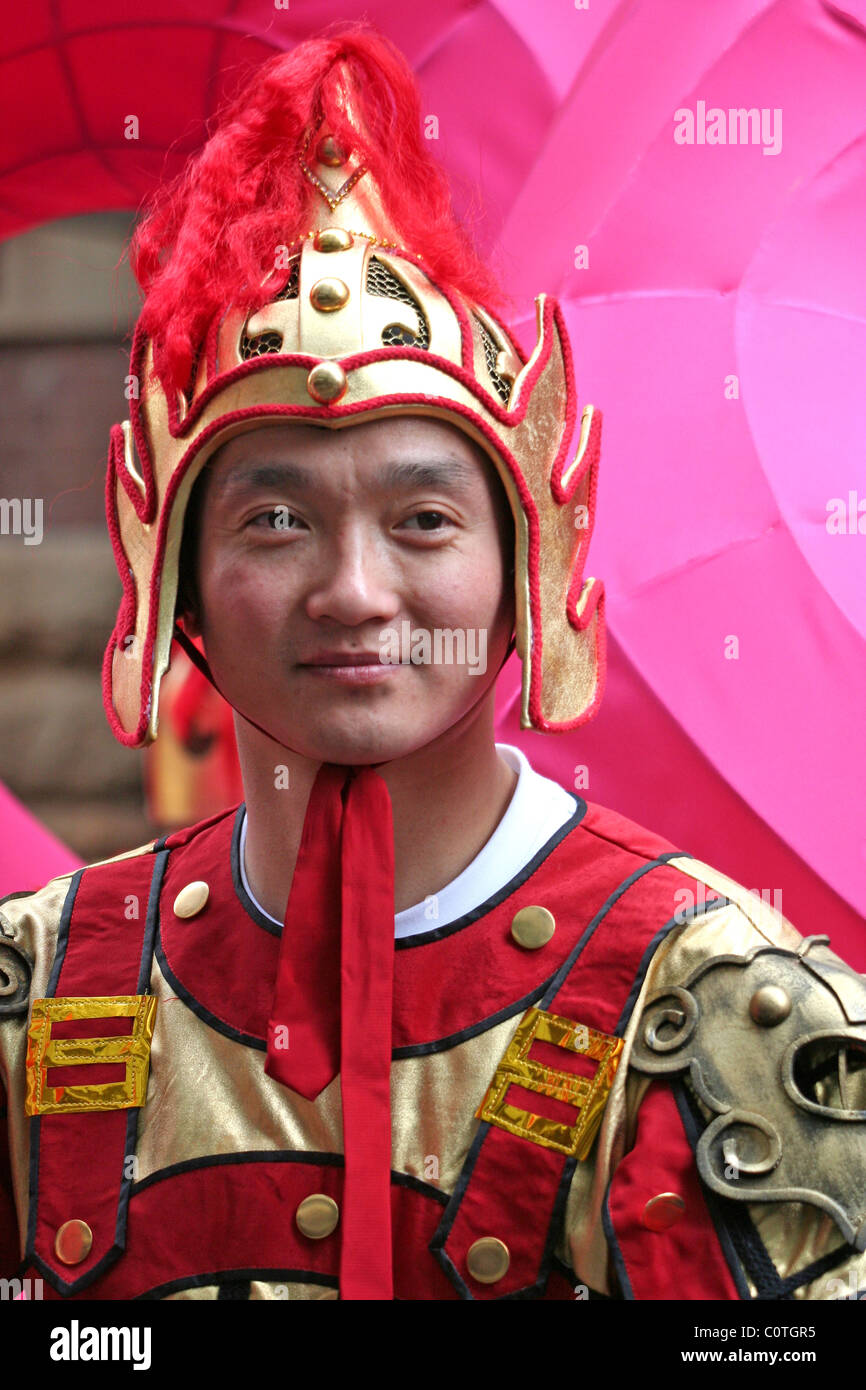 A guard in traditional costume takes part in the Chinese New Year ...