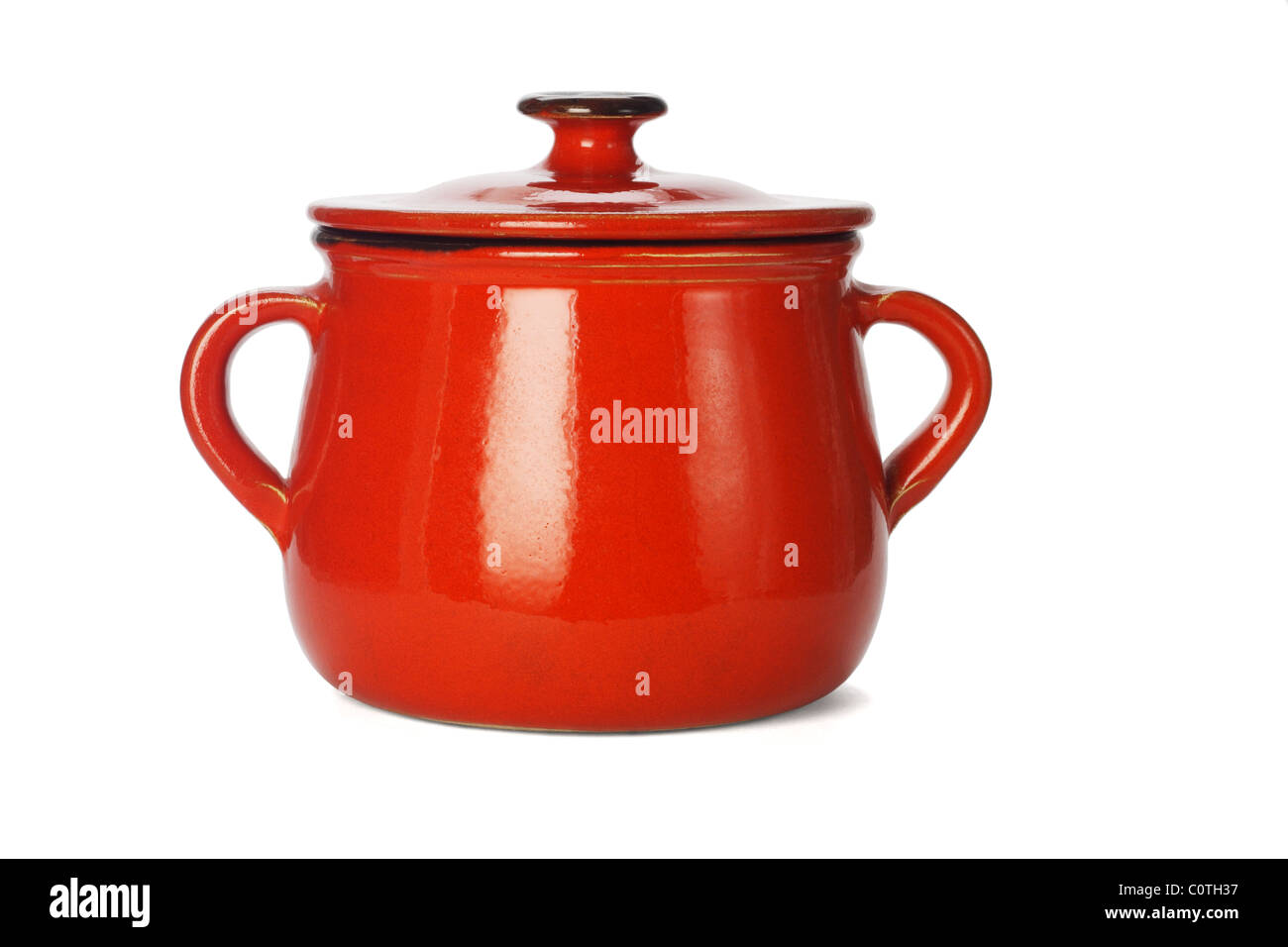 Red clay pot with lid on white background Stock Photo