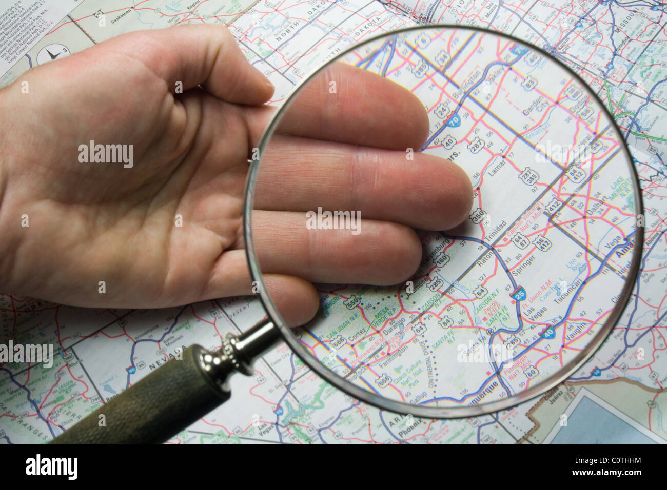 Large Magnifying Glass over Map Stock Photo