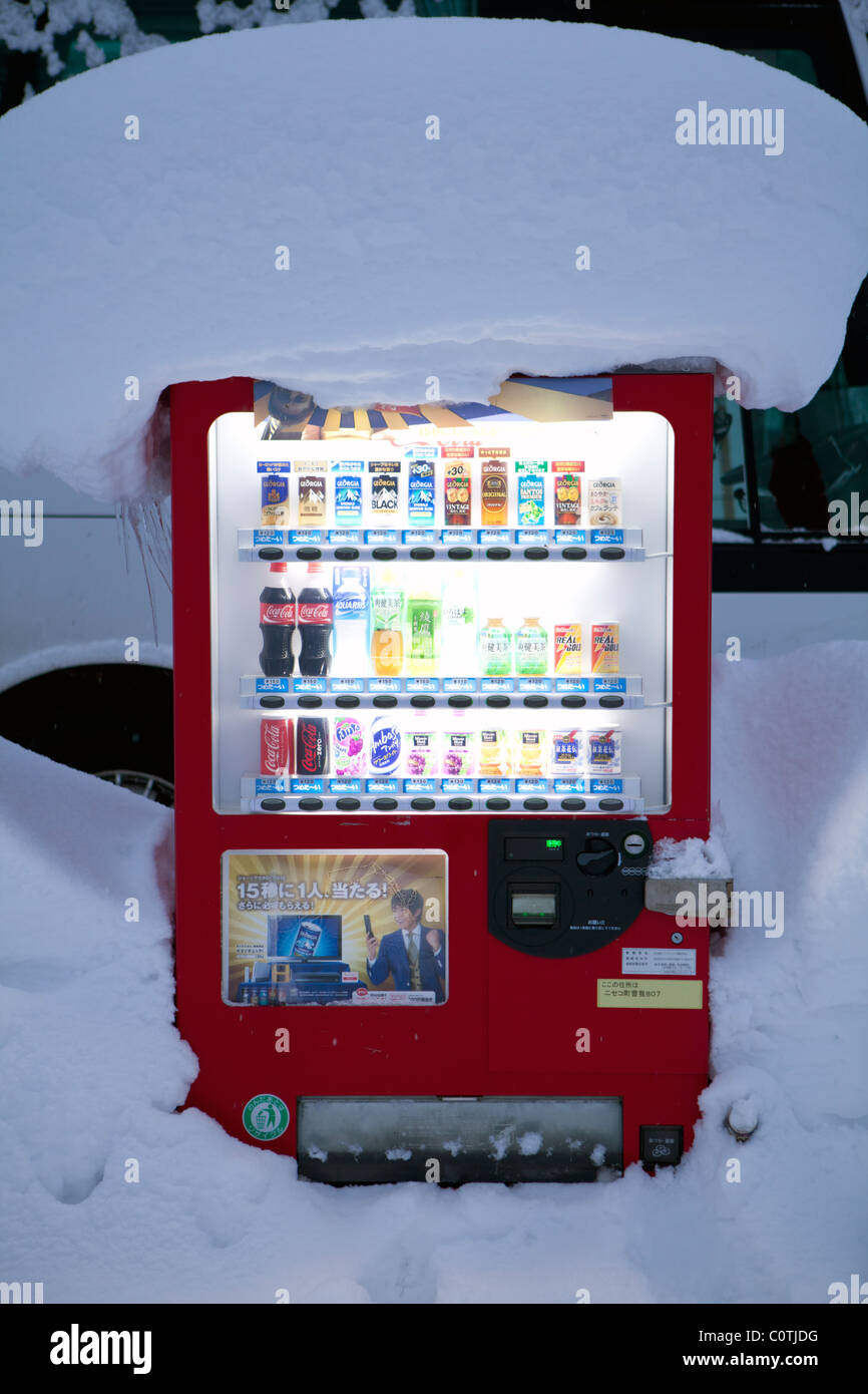 Vending machine in a snow drift, Niseko Japan Stock Photo Alamy