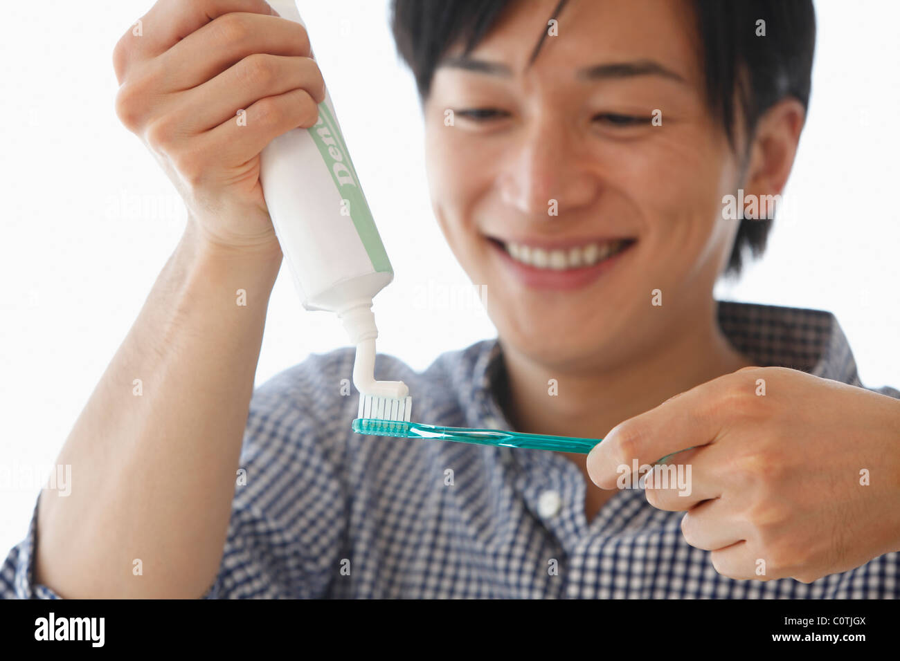 Squeezing toothpaste tube hires stock photography and images Alamy