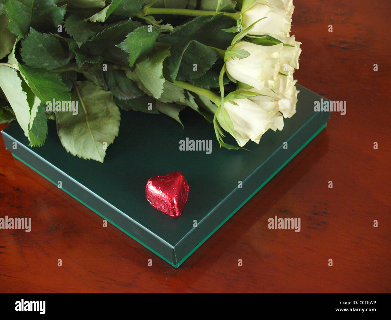 Roses and chocolates Stock Photo - Alamy