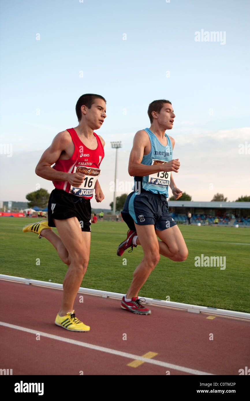 adult athletes running.Sport outdoor Athletics competition race track  Championships of Spain, July 3rd 4th 2010 Calvià Mallorca Stock Photo