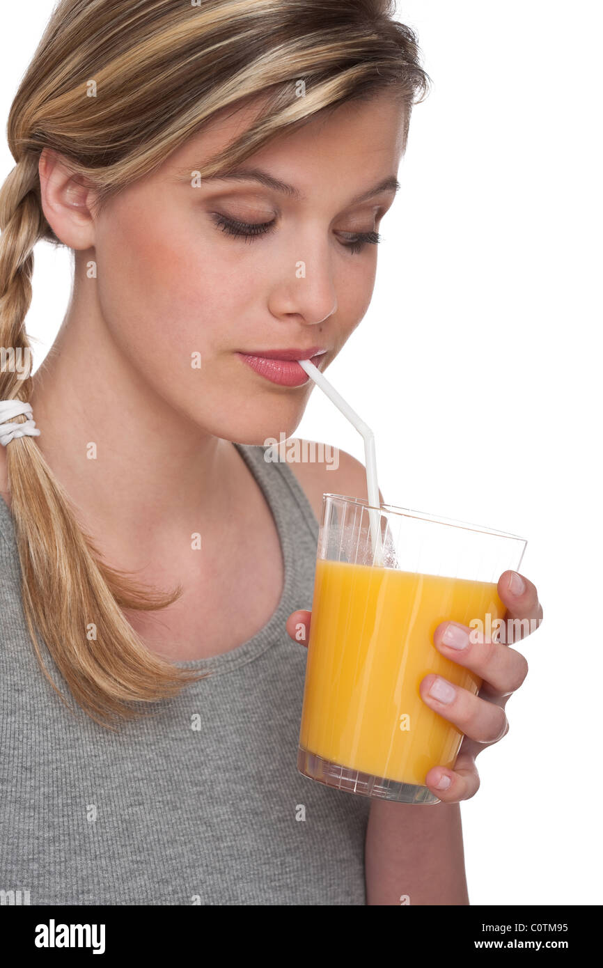 Healthy lifestyle series Blond woman drinking orange juice on white