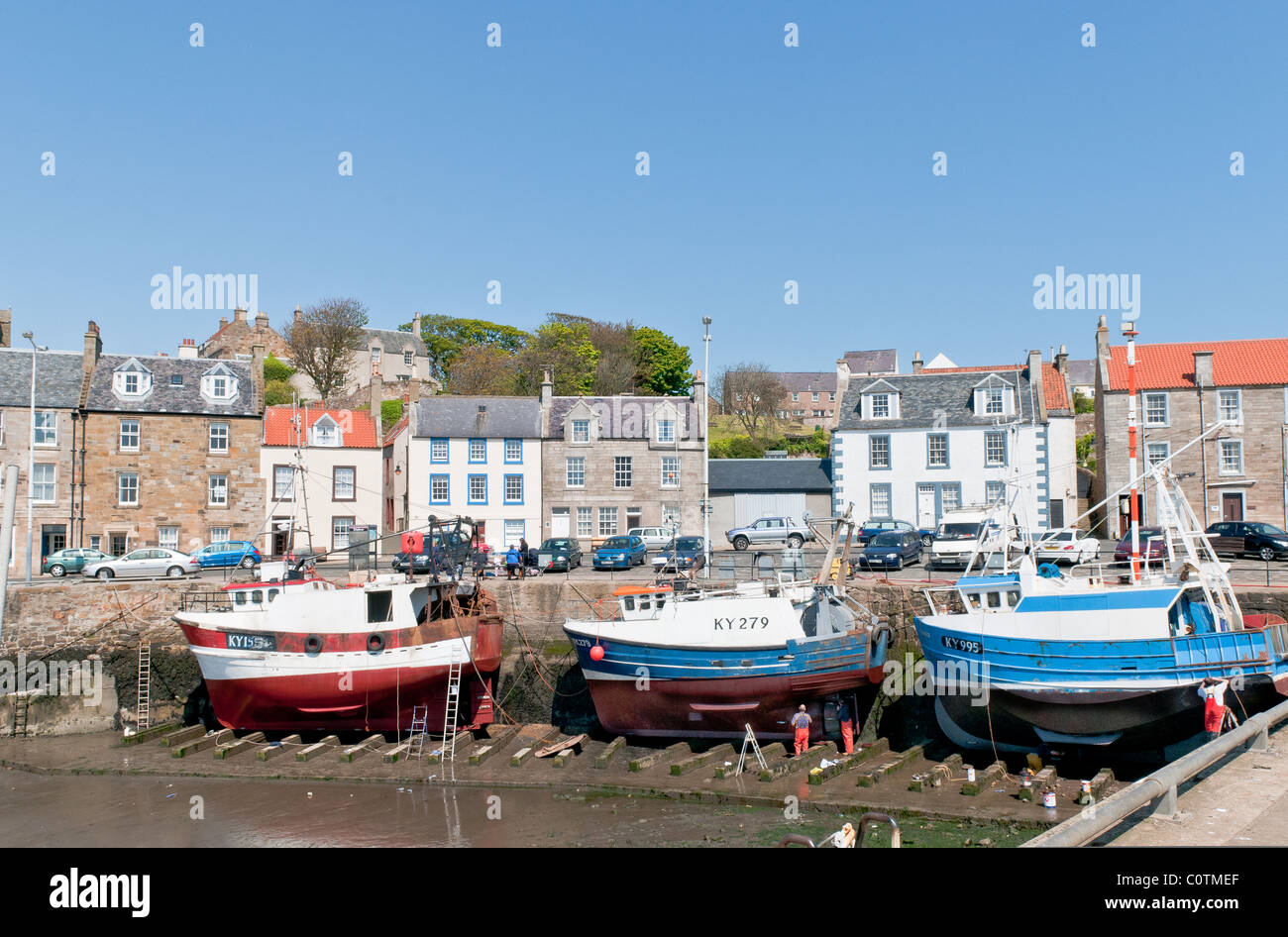 Repairing Fishing Boats in Pittenweem Harbour, Fife, Scotland Stock ...