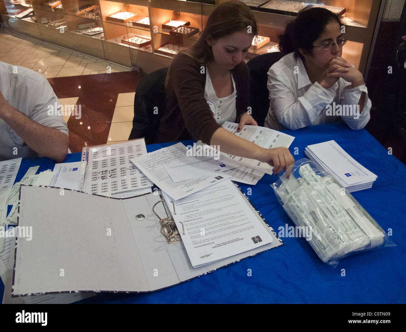 Shoppers across the country were asked today to give a saliva sample for bone marrow database. Jerusalem, Israel. 28/02/2011. Stock Photo
