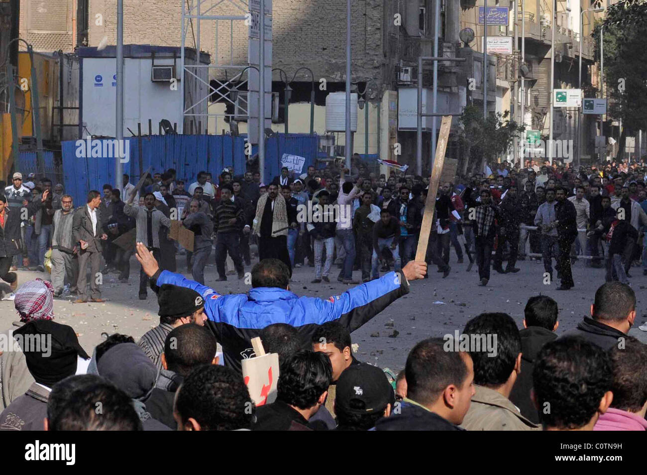 Clashes during between government thugs and anti-Mubarak protesters in Tahrir square on the 2nd of February 2011 in Cairo, Egypt Stock Photo