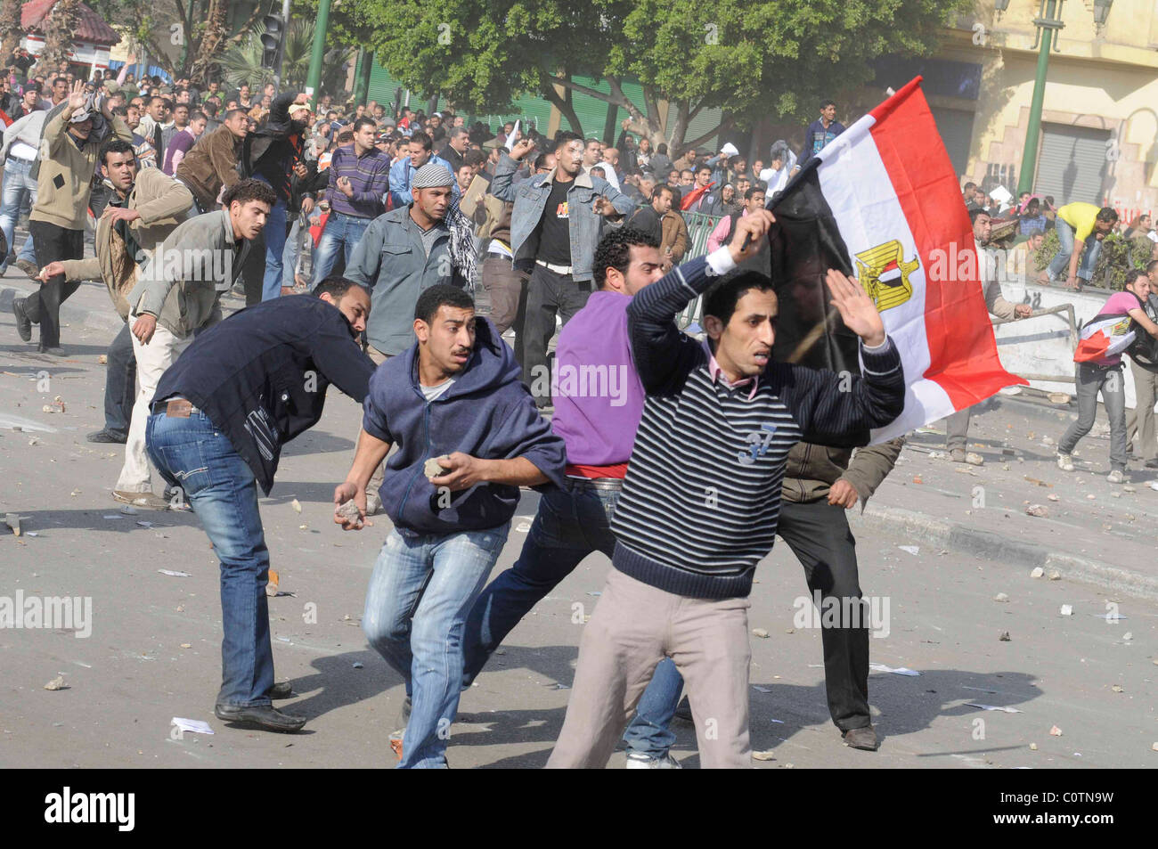 Clashes during between government thugs and anti-Mubarak protesters in Tahrir square on the 2nd of February 2011 in Cairo, Egypt Stock Photo