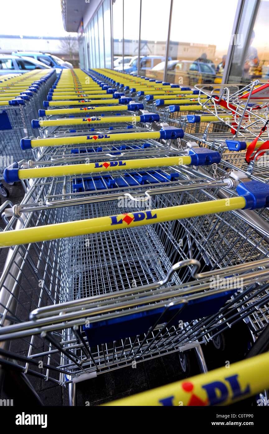 Lidl discount supermarket trolleys lined up Stock Photo