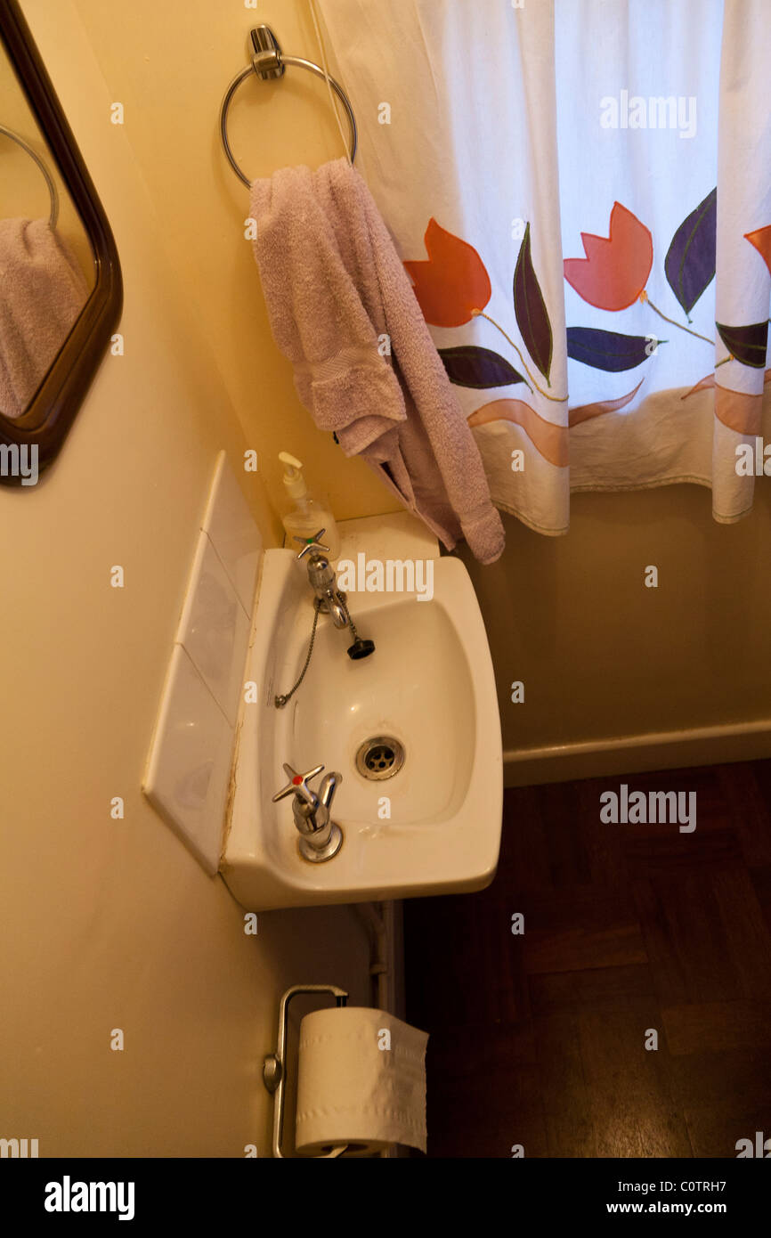 Wash basin in understairs toilet, England Stock Photo Alamy