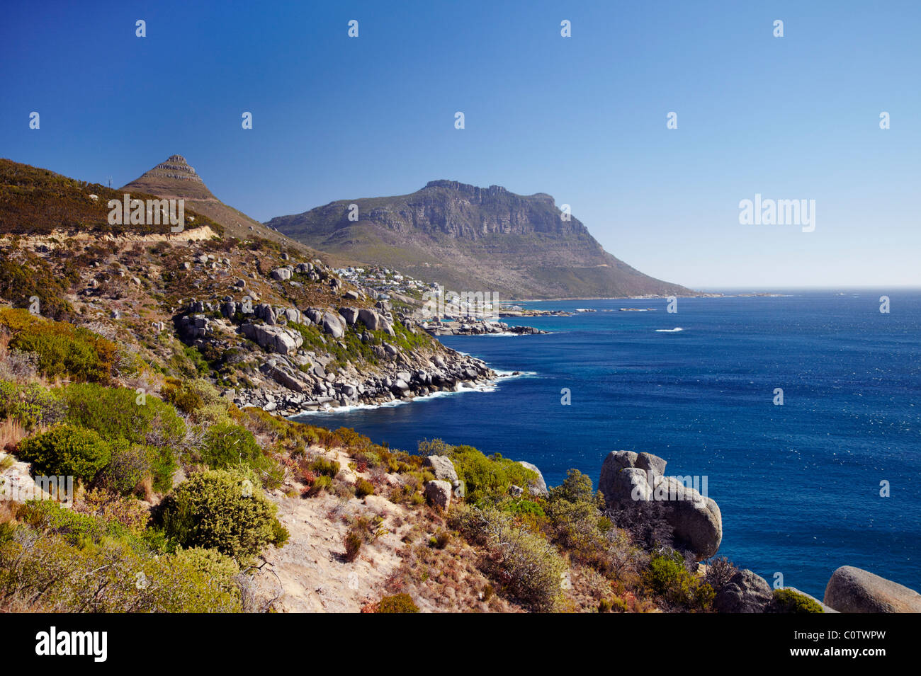 View along the Atlantic coast to town of Llandudno, south of Cape Town, Western Cape, South Africa. Stock Photo