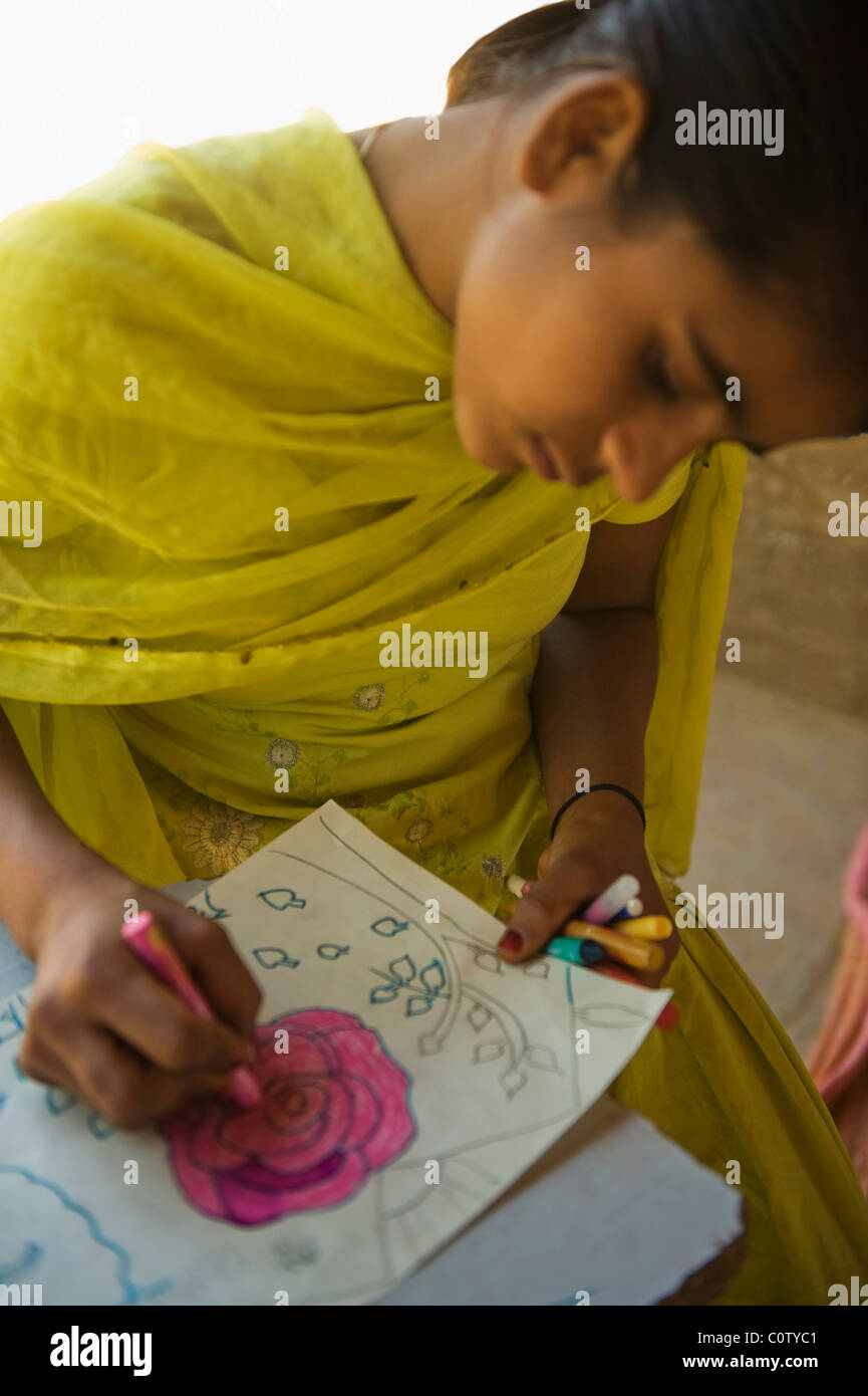 Girl making a drawing Stock Photo