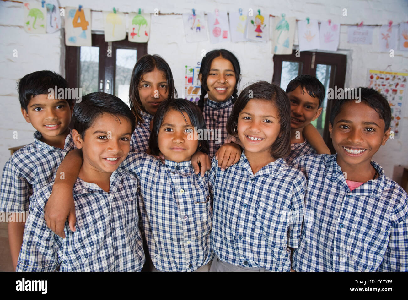 Portrait of students smiling together Stock Photo