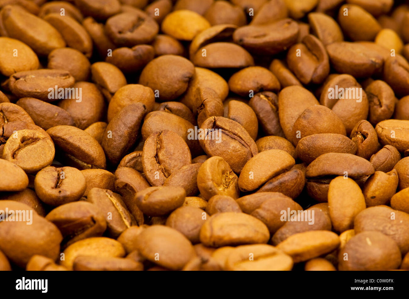 Close up of freshly roasted coffee beans Stock Photo - Alamy
