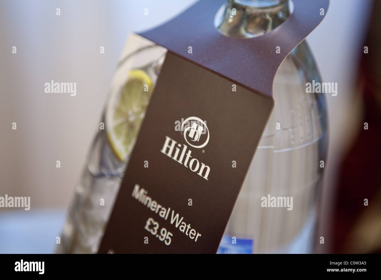 a bottle of mineral water in a Hilton hotel room Stock Photo Alamy