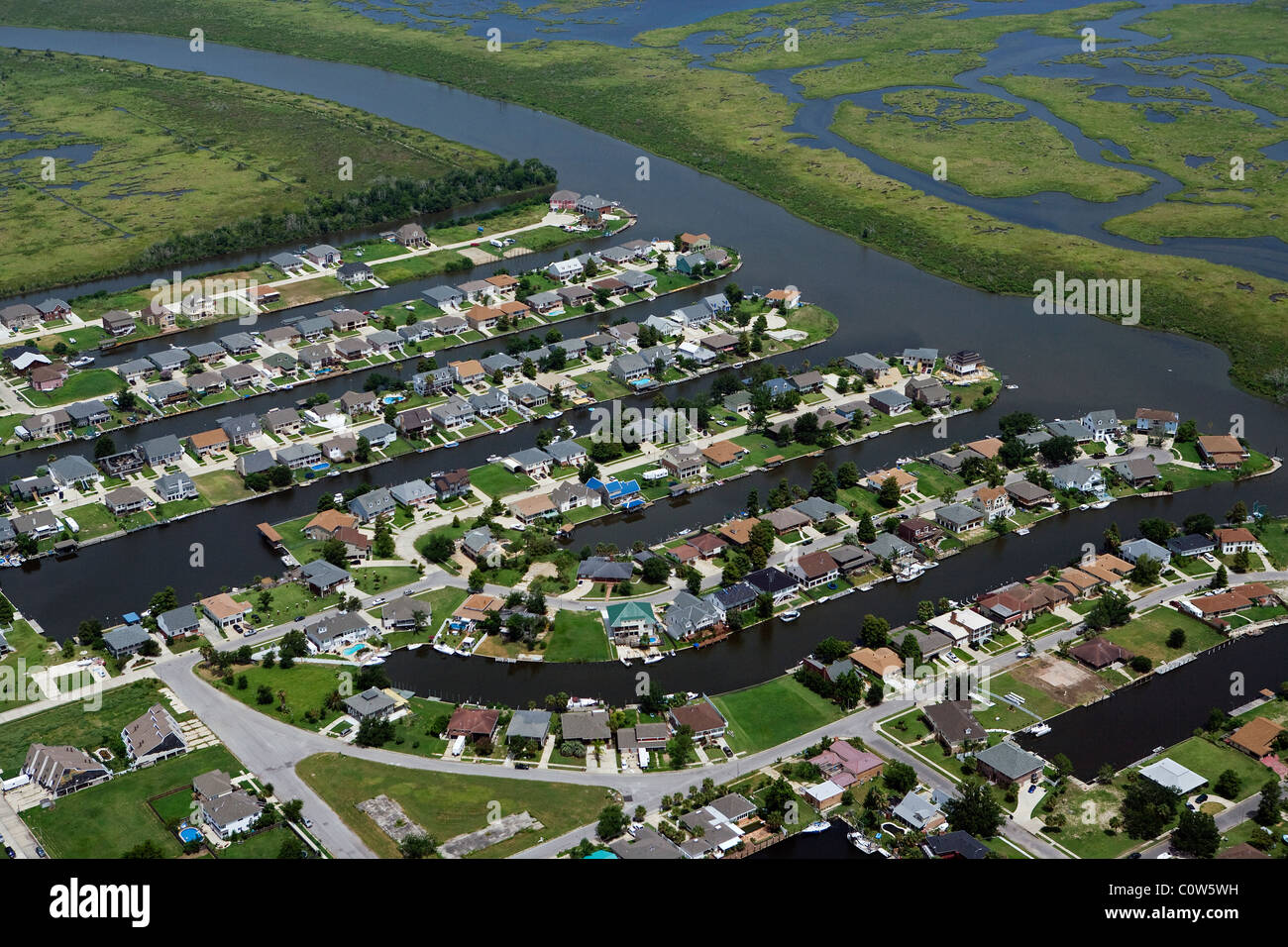 aerial view above waterfront homes northern New Orleans Louisiana Stock Photo