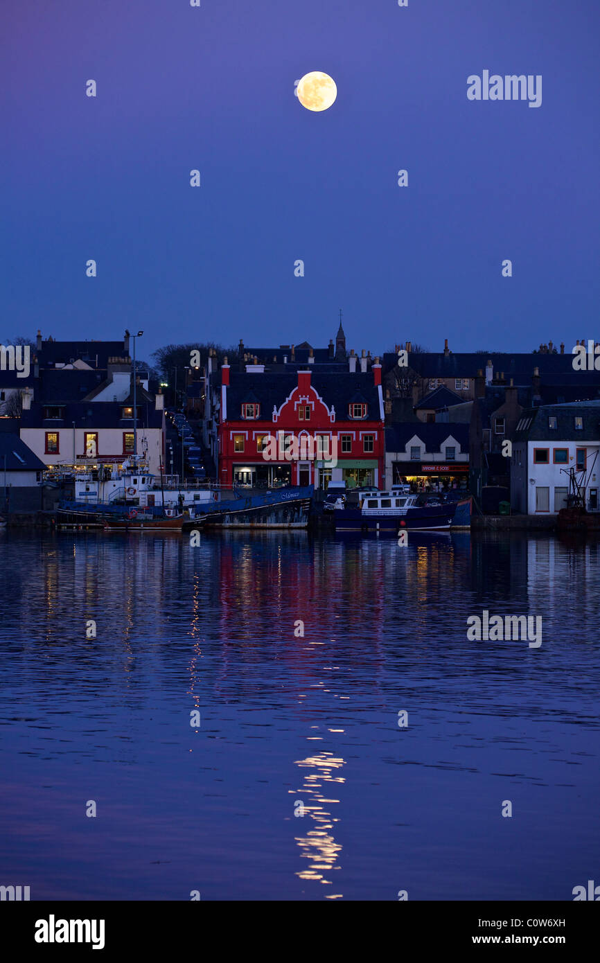 Stornoway Harbour with full moon at dusk Stock Photo Alamy