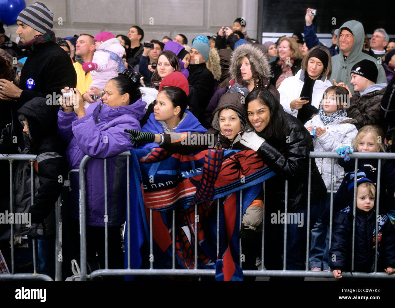 Crowded space on New York street. Close-up  multi ethnic crowd of people watching parade. USA. Stock Photo