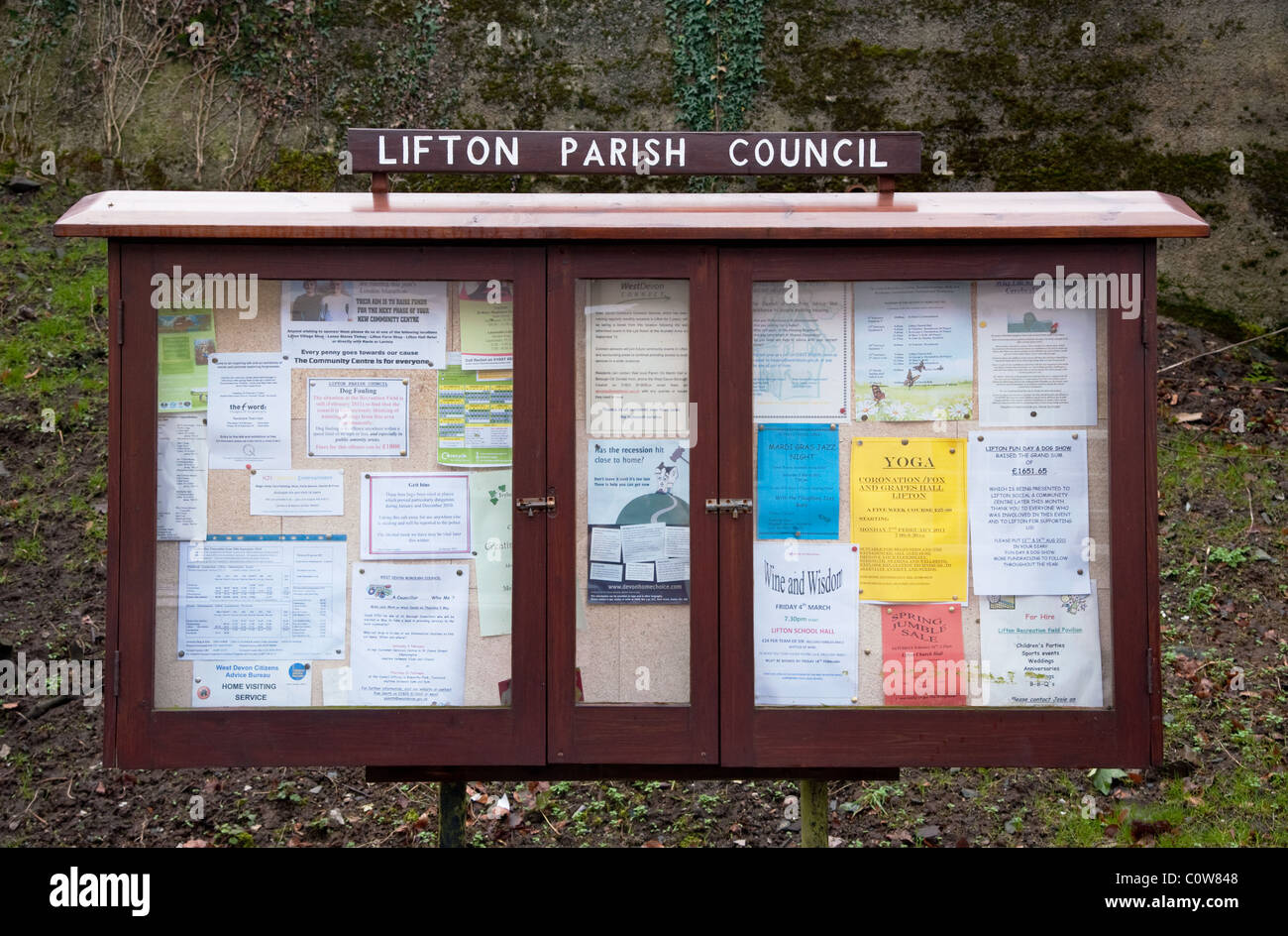 Community notice board maintained by a local parish council. The number of  notices suggests this is an active community Stock Photo - Alamy