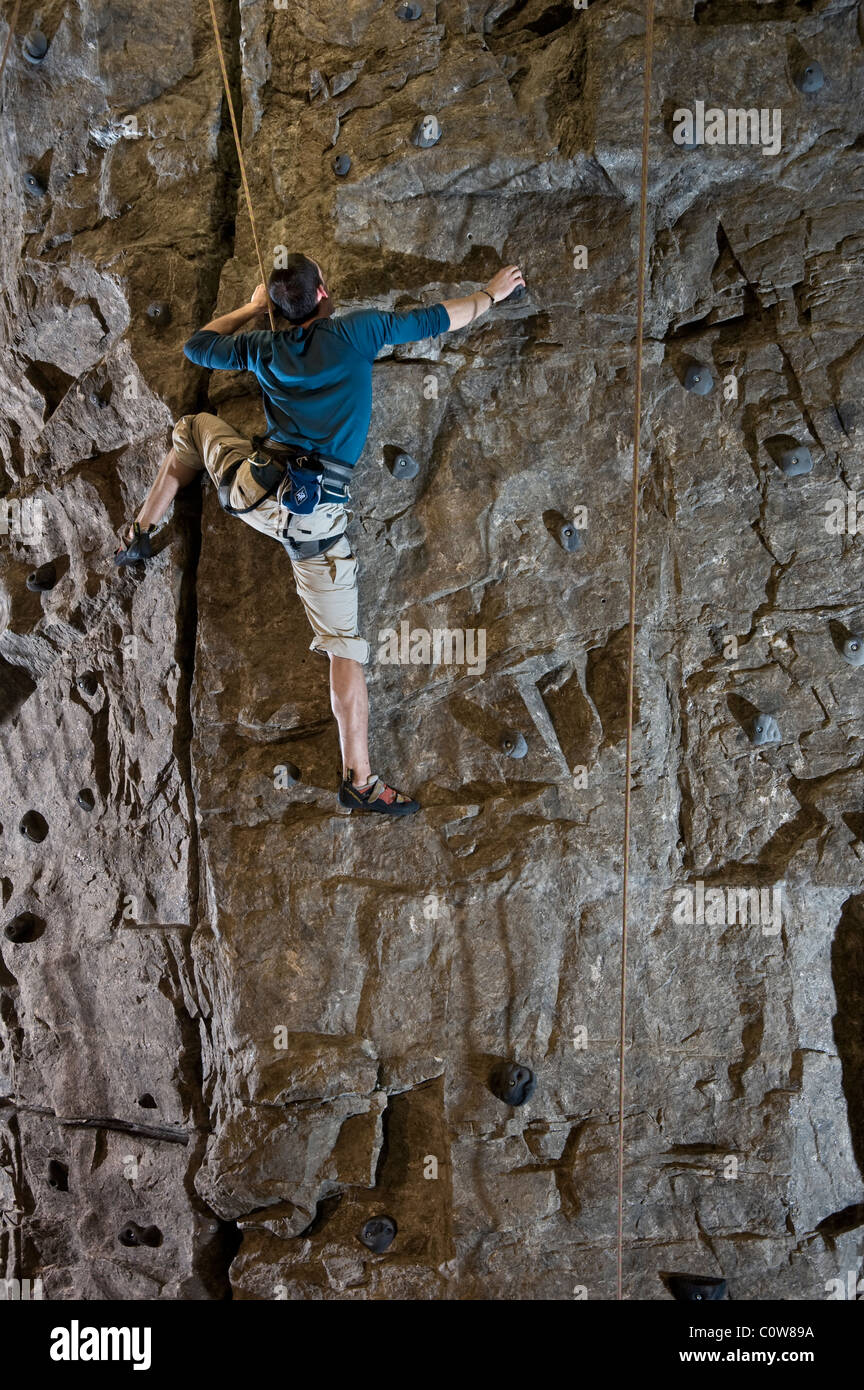 Rock Climber Climbing Indoor Rock Wall Stock Photo