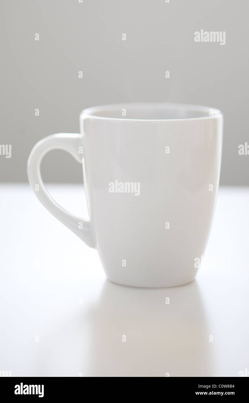 clean and simple white coffee or tea cup or mug Stock Photo