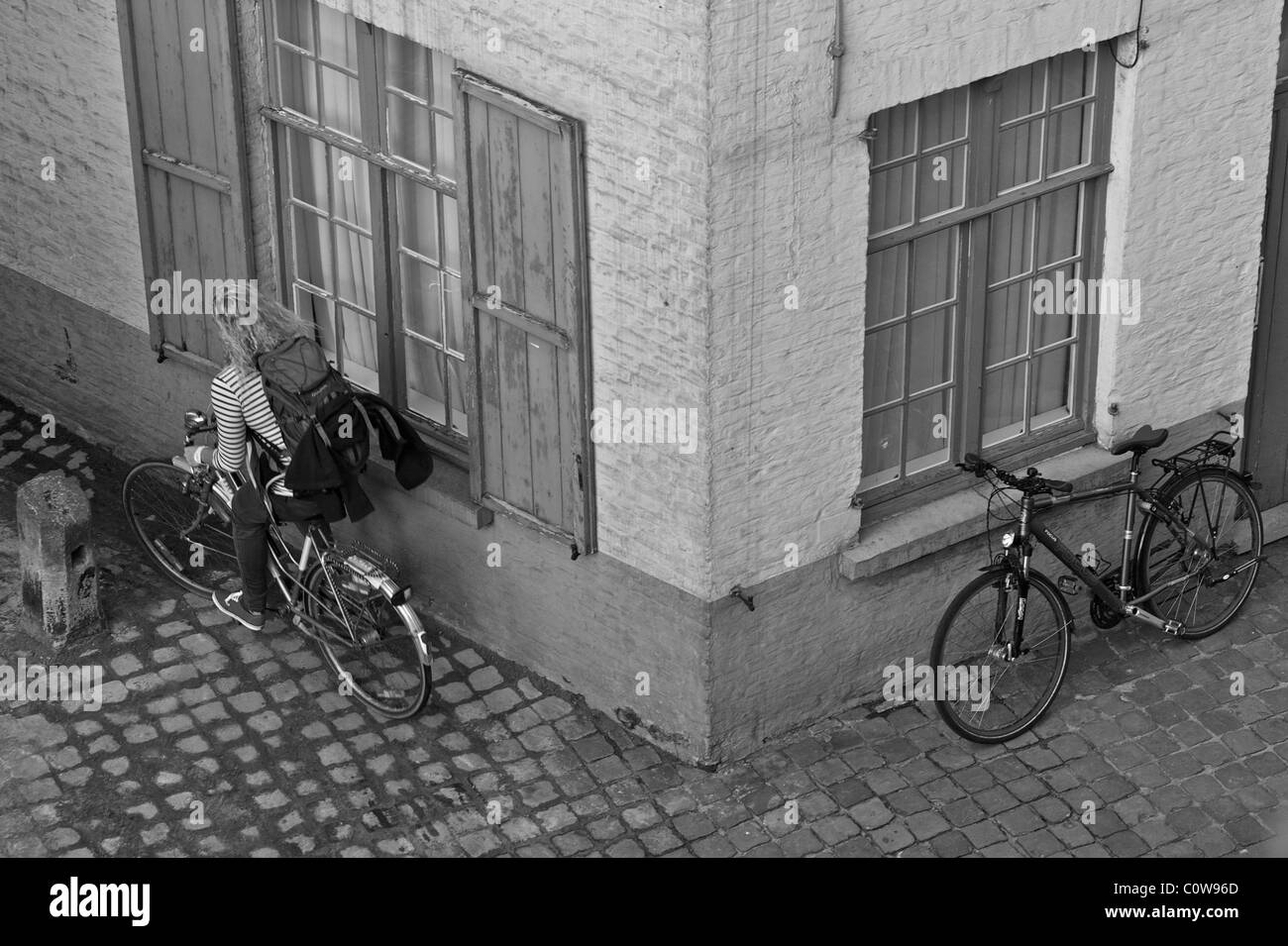 Bicycle Race a tongue in cheek take on the cobbled streets of Bruges Brugge Belgium Stock Photo