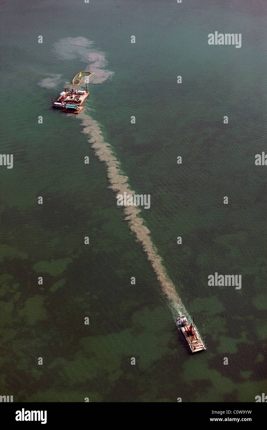 aerial view above sediment dredge barge Biscayne Bay Miami Florida Stock Photo