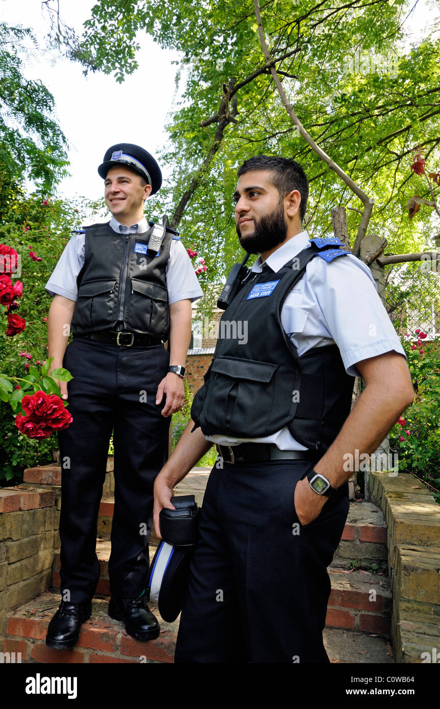 Police Community Support Officers in the Olden Garden a community garden in Highbury, London England UK Stock Photo