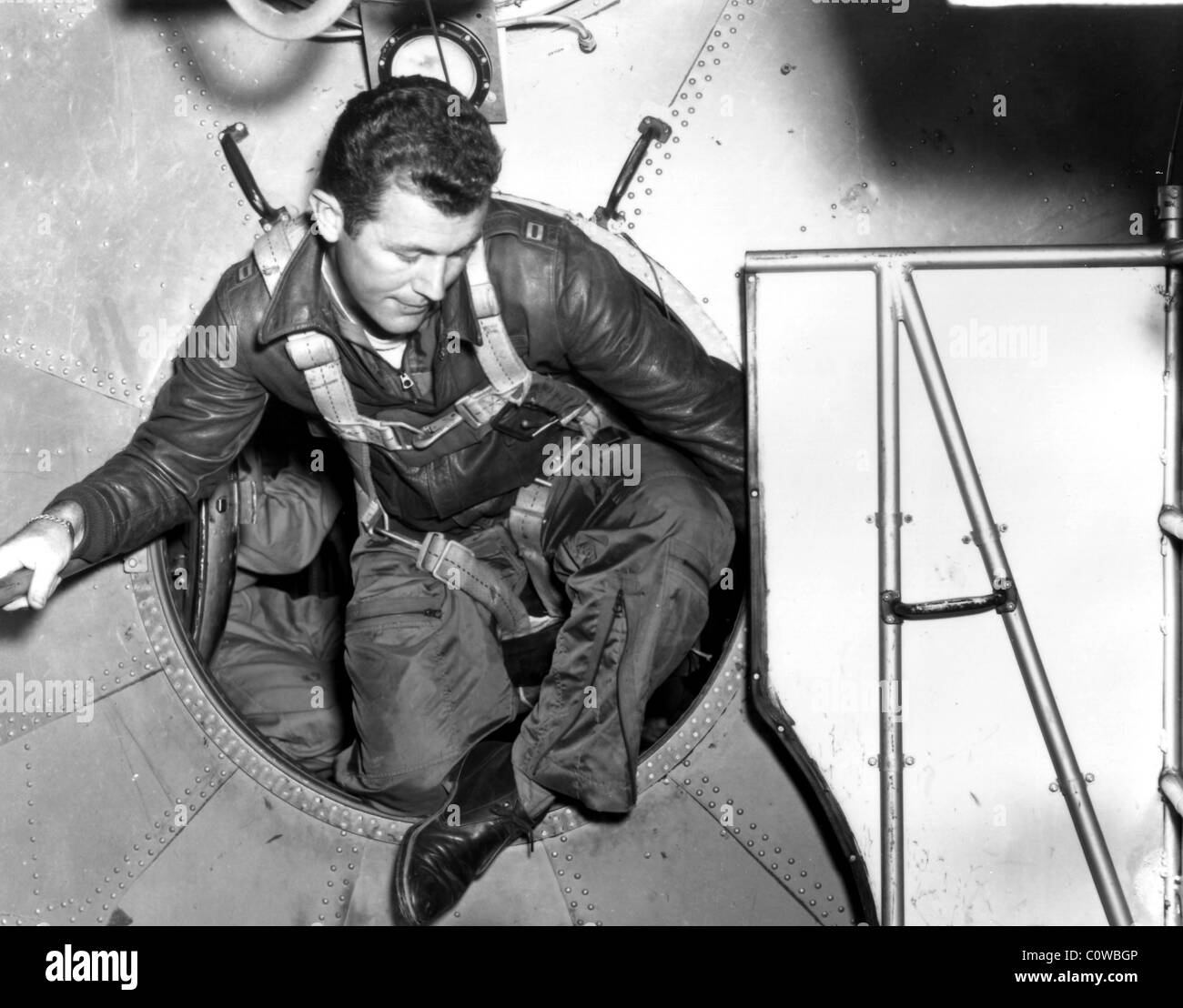 Capt. Charles E. 'Chuck' Yeager transfers from a B-29 to the Bell X-1A. Stock Photo