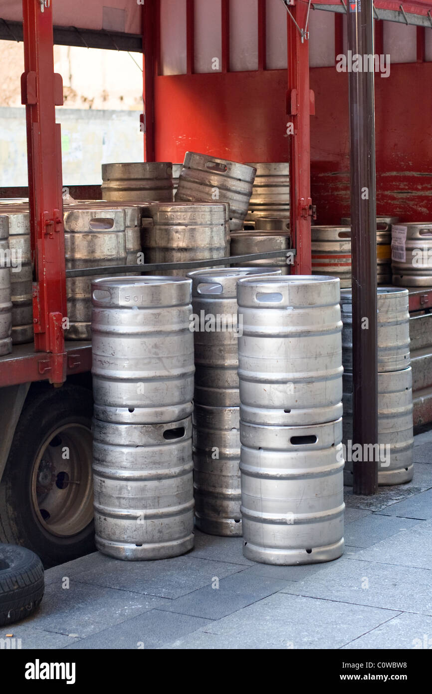 Beer barrels stacked on the street Stock Photo Alamy