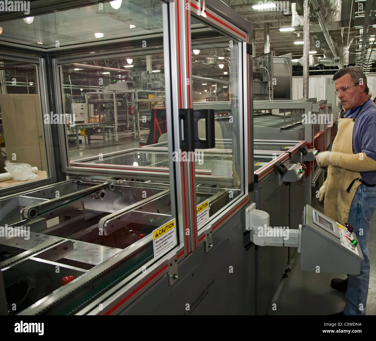 Perrysburg, Ohio - A worker manufactures thin-film solar panels at WK Solar. Stock Photo