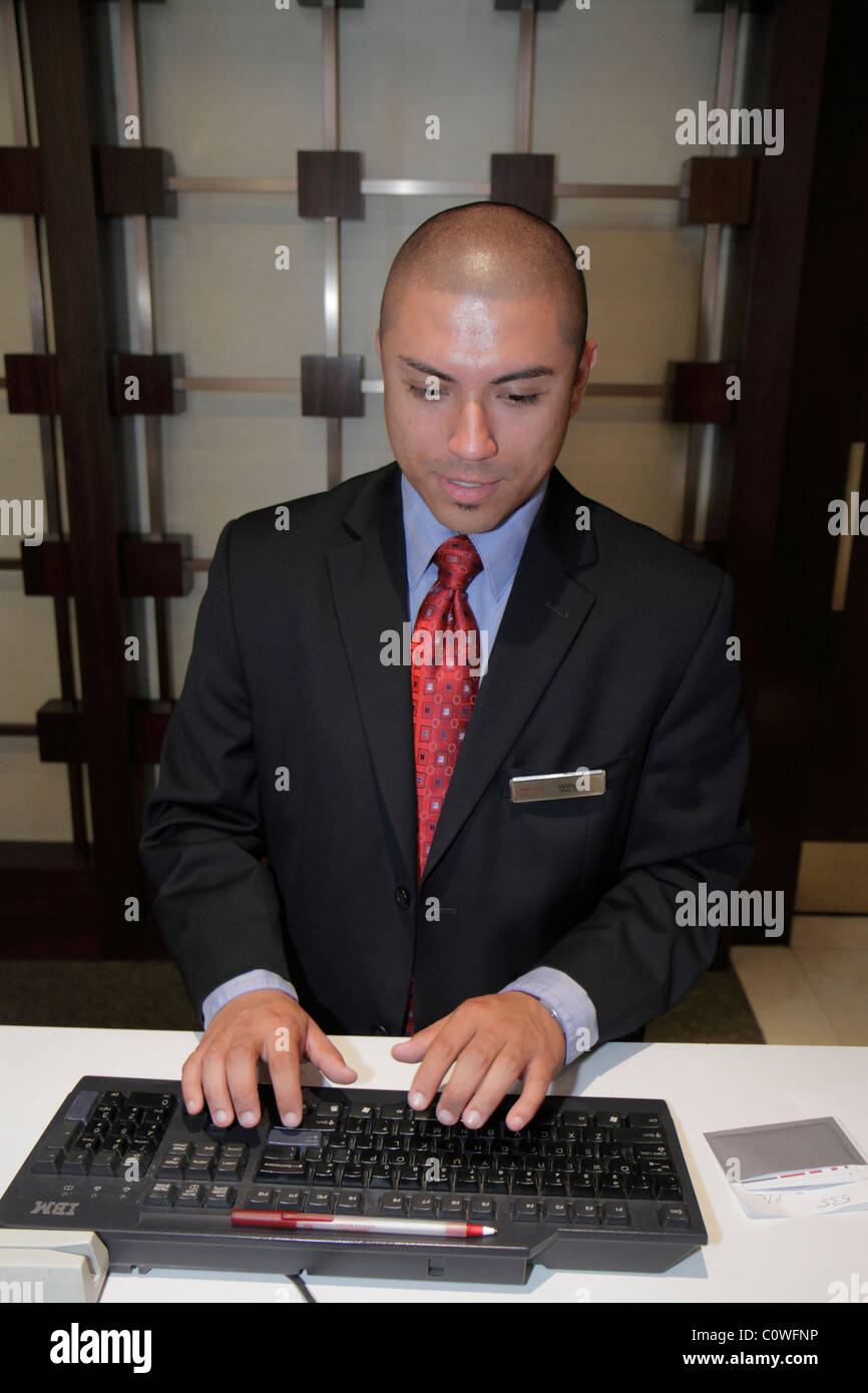 Orlando Florida Marriott Orlando Airport Hotel Hispanic Man Front