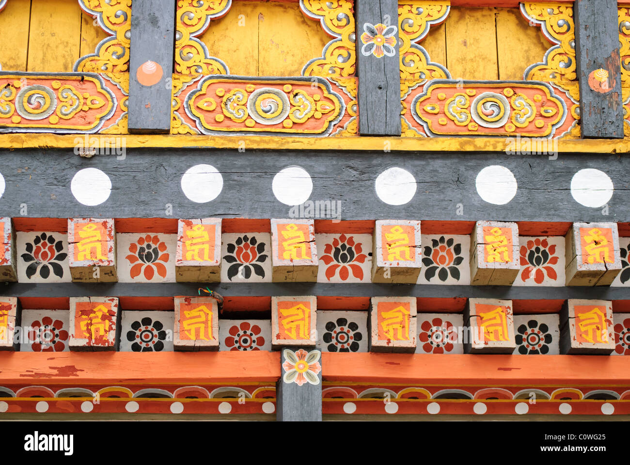 Traditional motifs on a building in Paro Dzong, Paro Stock Photo
