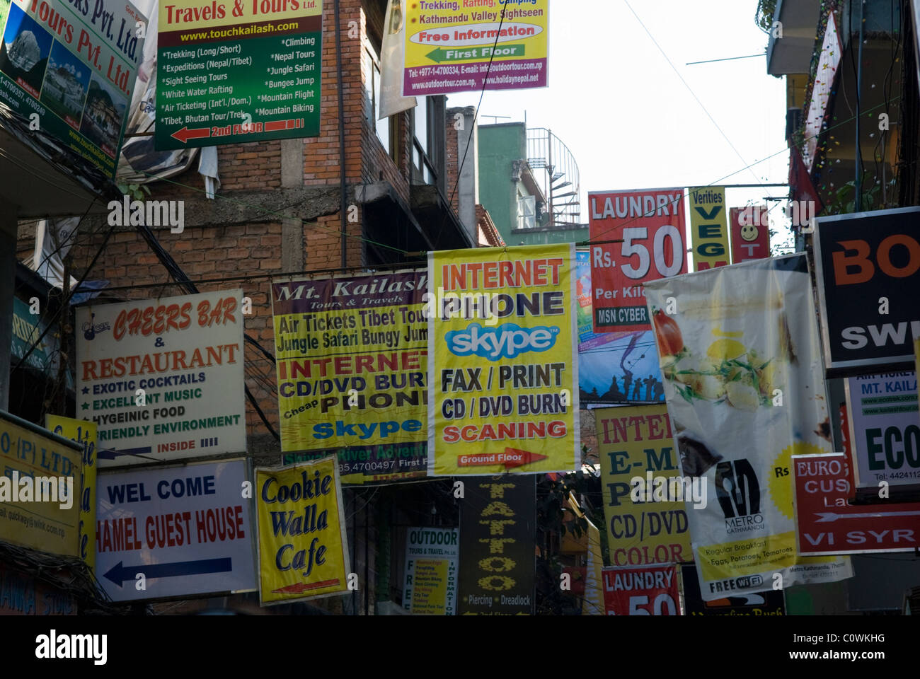Advertising signs in the Thamel district, Kathmandu, Nepal. Stock Photo