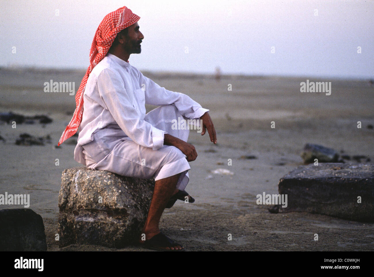 khobar saudi arabia -- a saudi rests by the arabian gulf. Stock Photo