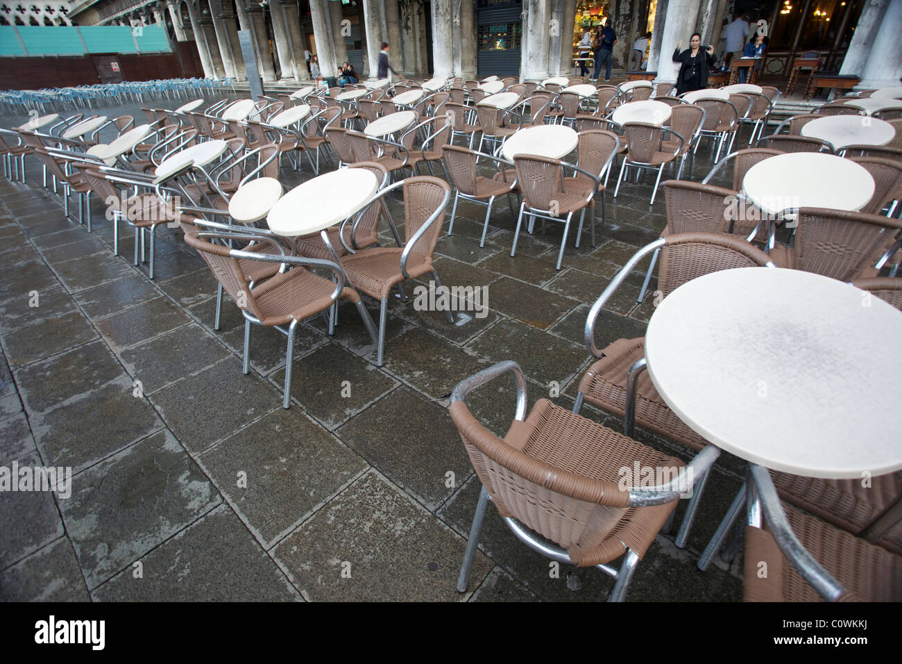 A large number of chairs and tables at a restaurant in St marks Square Venice, Italy Stock Photo
