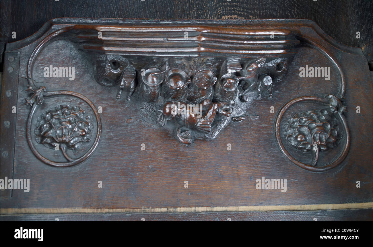 Manchester Cathedral Misericord : The Hunter Hunted Stock Photo