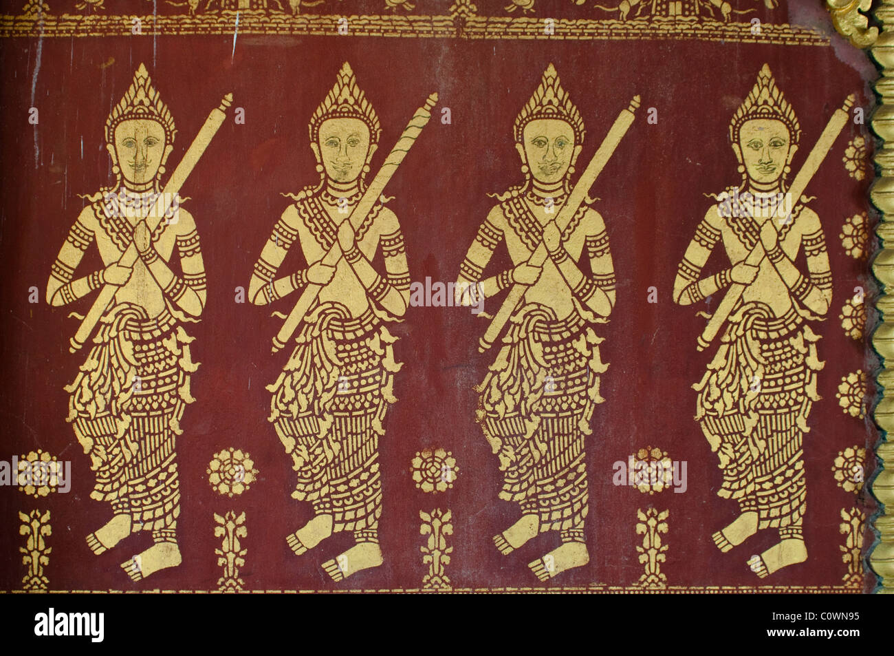 Gold figure paintings, Buddhist temple, Wat Khili, Luang Prabang, Laos Stock Photo