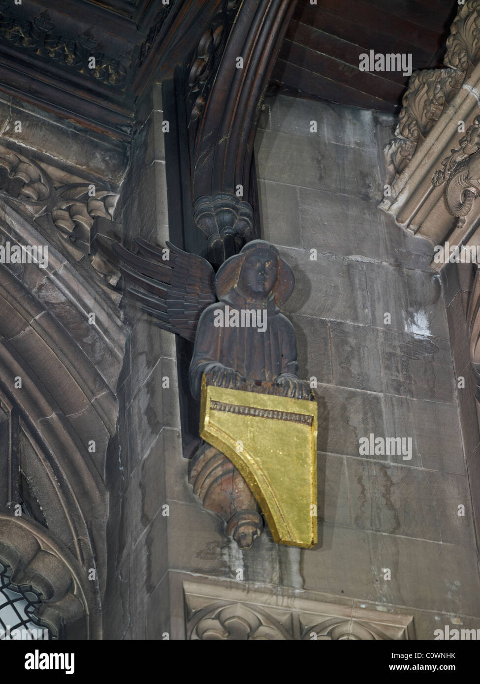 Manchester Cathedral angel with keyboard Stock Photo