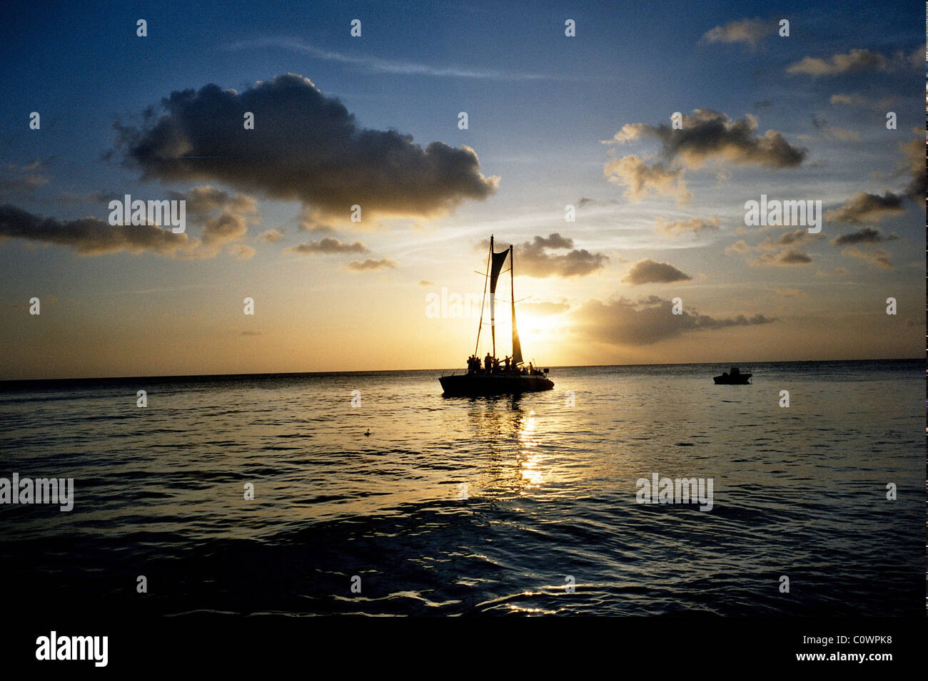 silhouette of yacht at sunset Stock Photo - Alamy