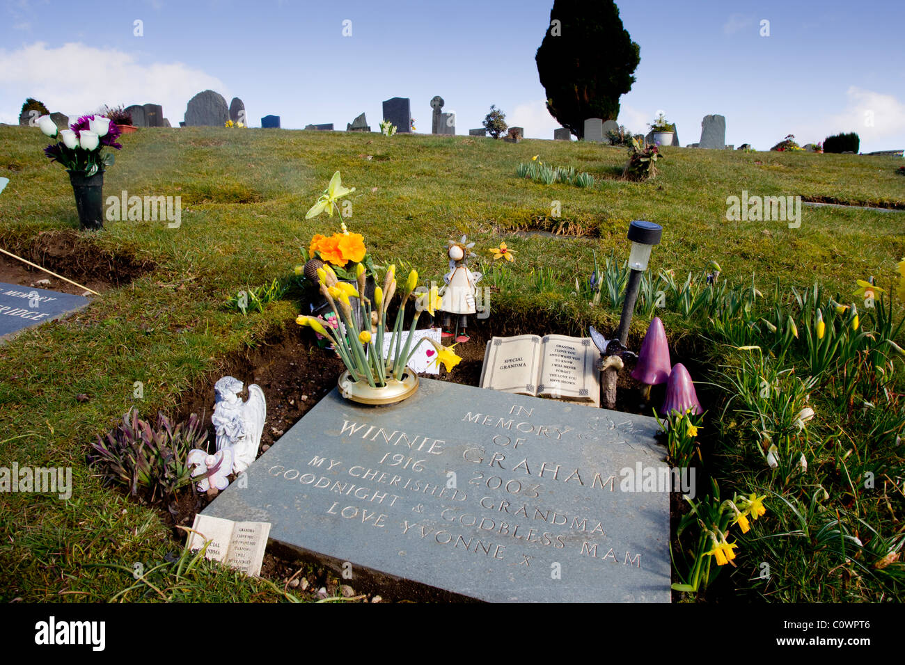 Windermere grave yard with head stones flowers Stock Photo