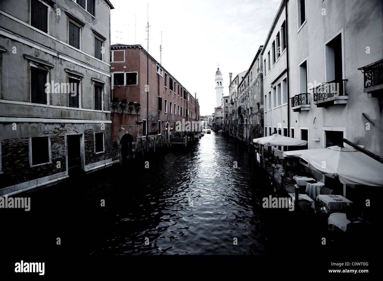 A venetian waterway canal in Venice Italy Stock Photo