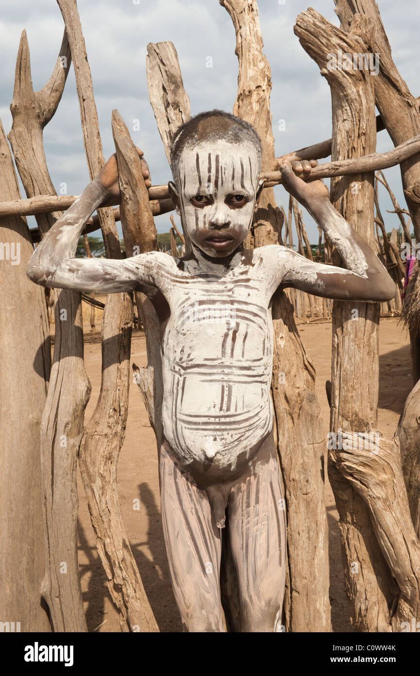 Karo boy with facial and body paintings, Omo river valley, Southern Ethiopia Stock Photo